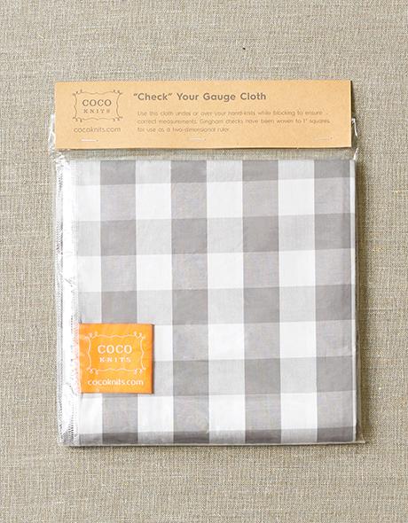 CHECK YOUR GAUGE CLOTH // cocoknits.com //
Use this cloth under or over your hand-knits while blocking to ensure correct measurements. Gingham checks have been woven to 1" squares for use as a two-dimensional ruler.